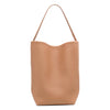 Large N/S beige leather tote bag