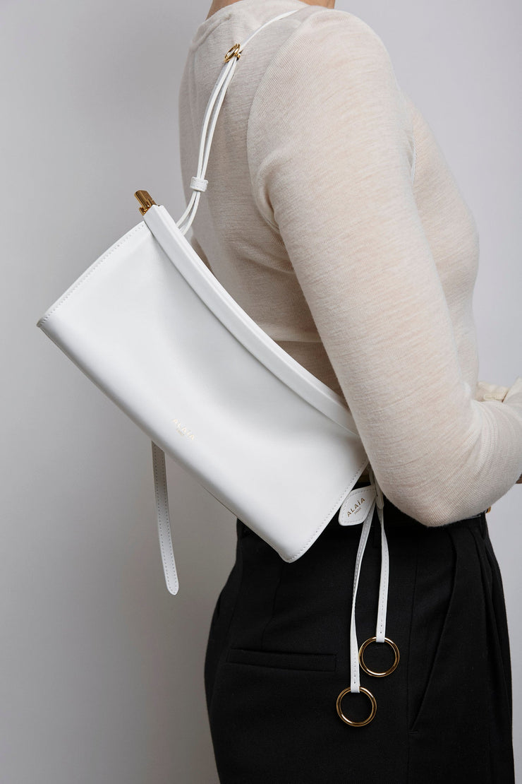 Le Click east west small white bag