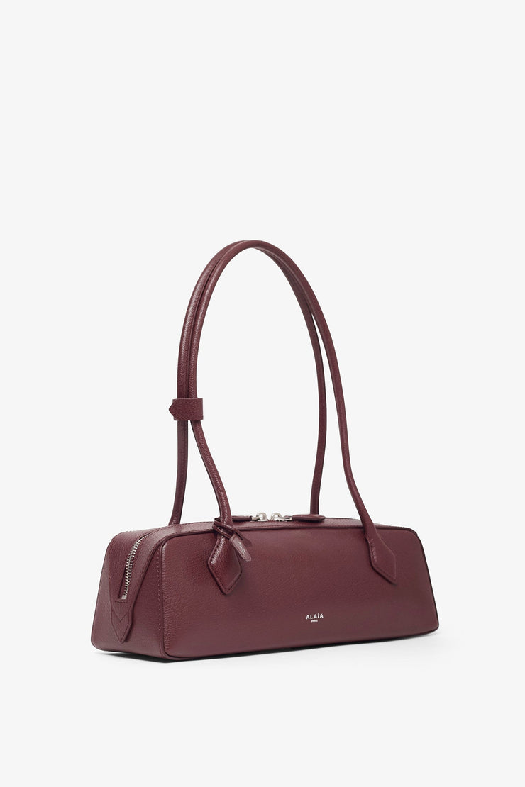 Le Teckel medium dark red leather bag