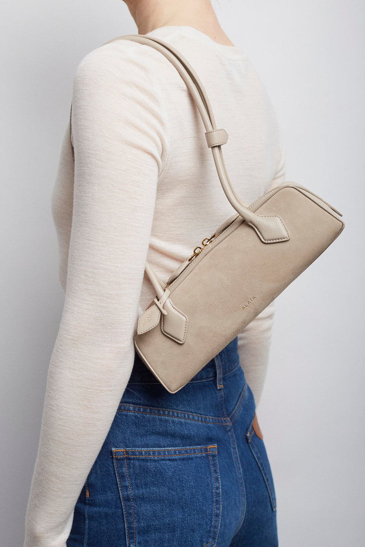 Le Teckel small greige bag