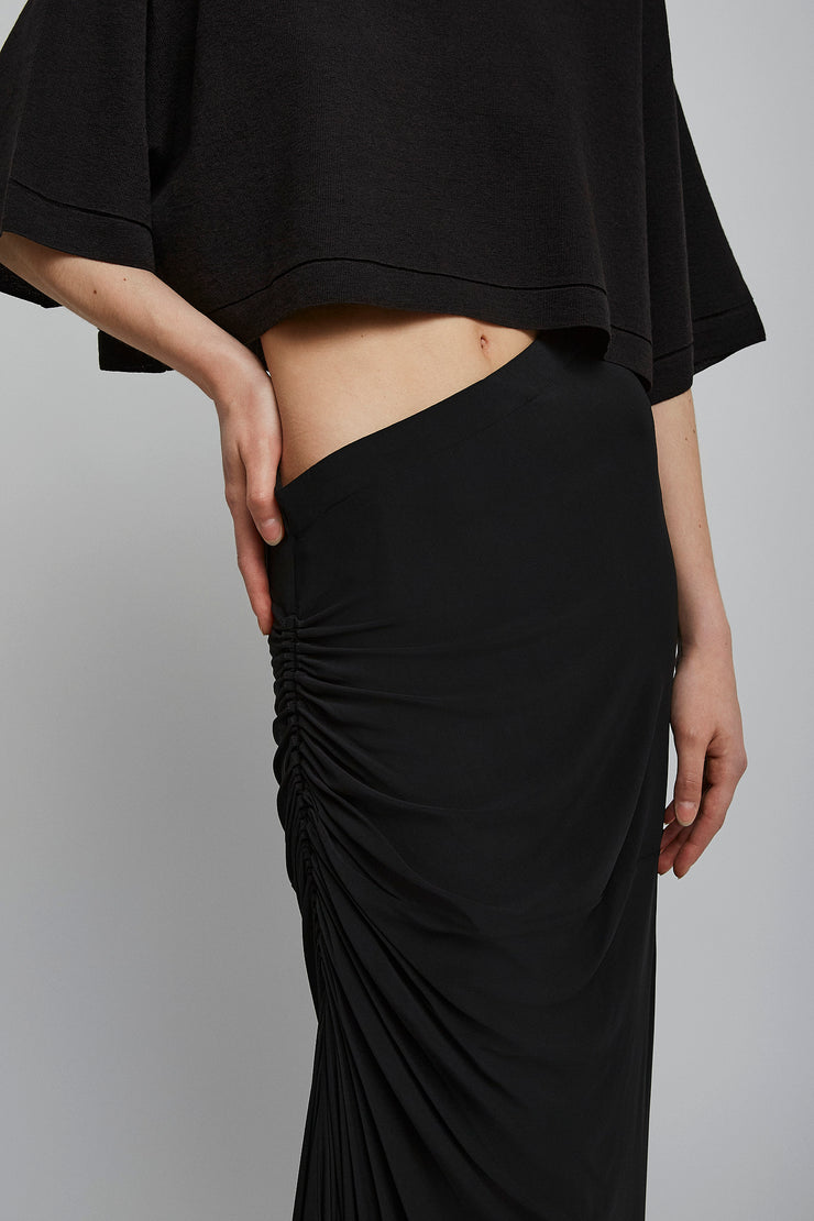 Soft jersey draped black skirt
