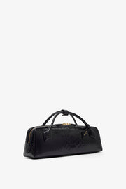 Le Teckel black shiny python clutch