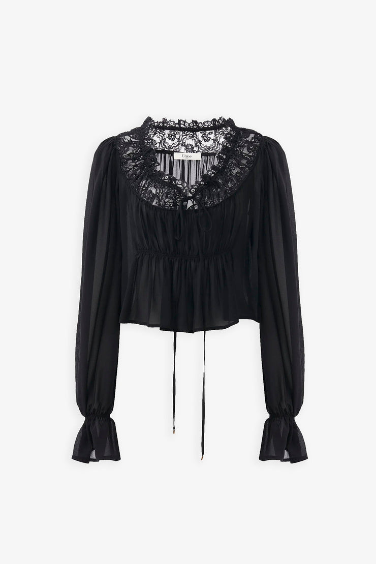 Scoop-neck cropped black top in silk