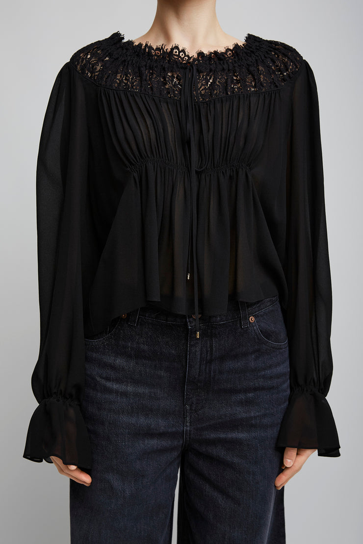 Scoop-neck cropped black top in silk