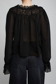 Scoop-neck cropped black top in silk