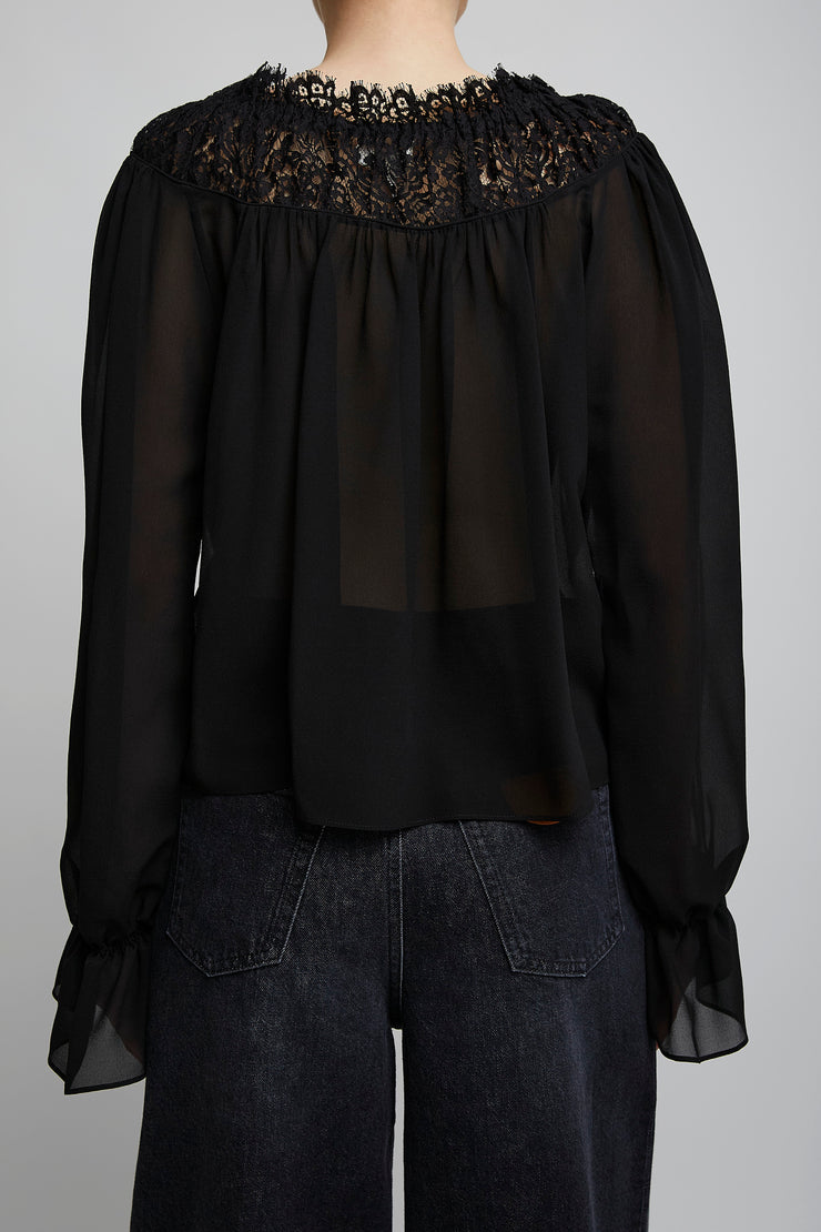 Scoop-neck cropped black top in silk