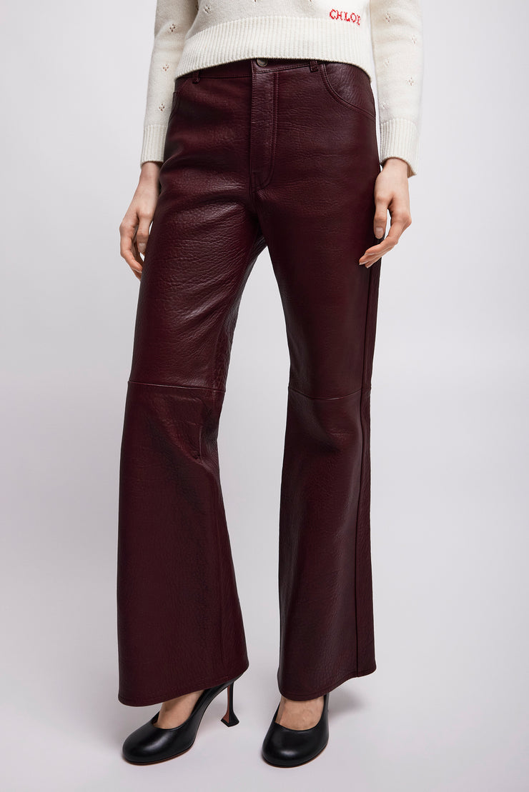 Flared trousers in leather