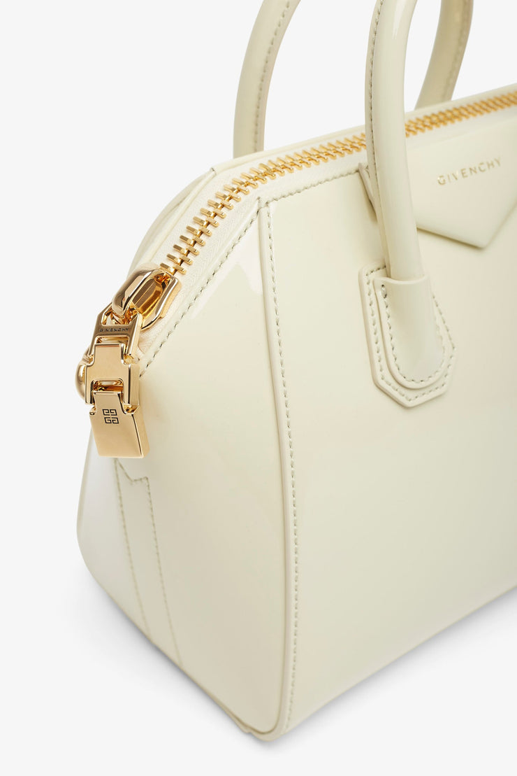 Antigona mini cream patent bag