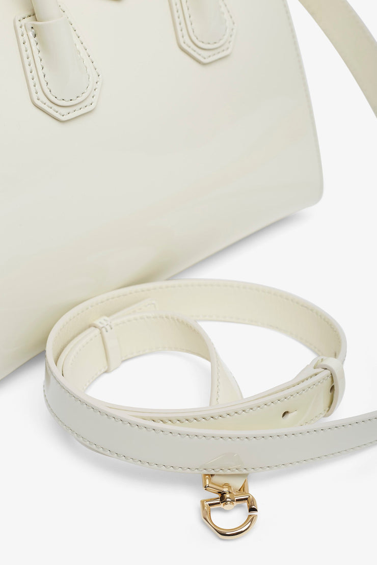 Antigona mini cream patent bag