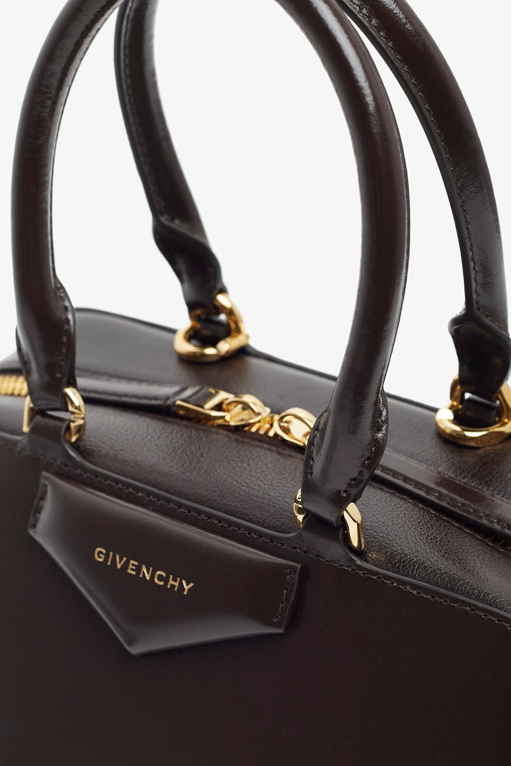 Antigona east west small brown bag