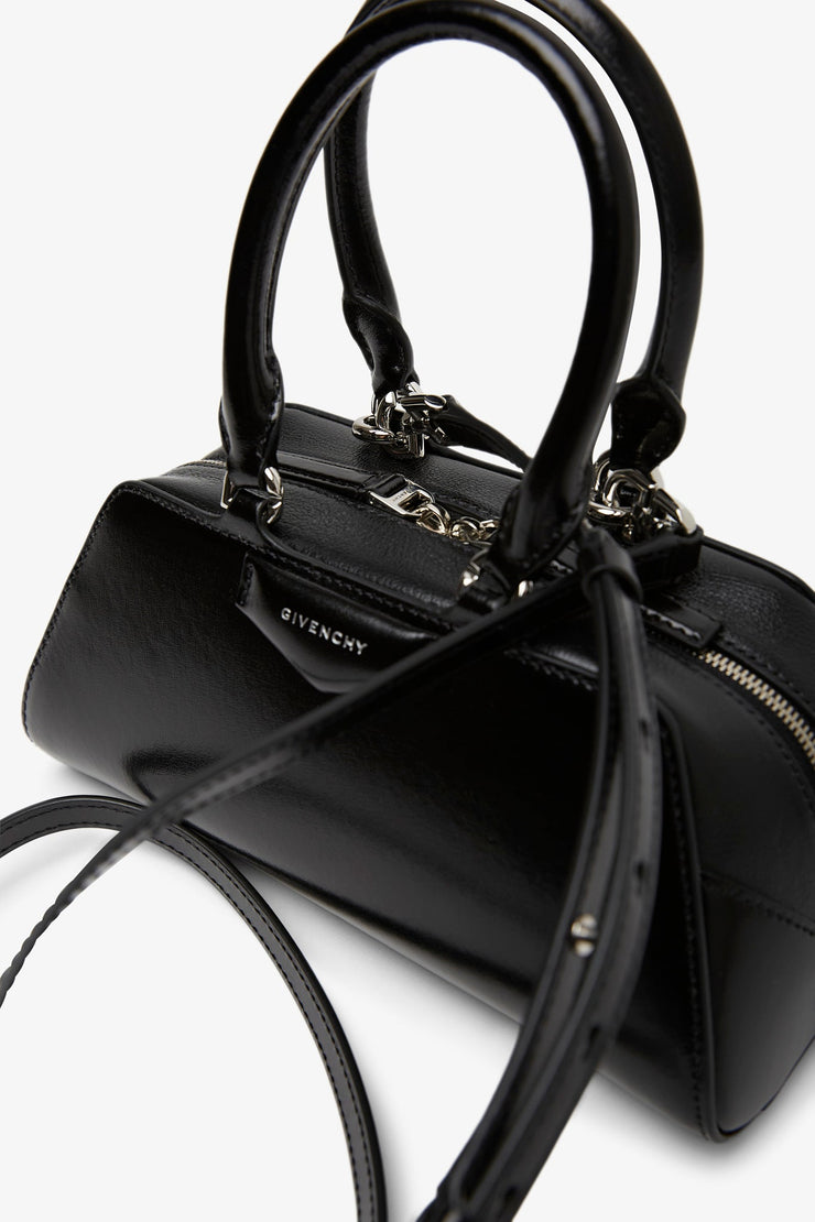 Antigona east west black mini bag