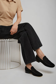 Man's black leather loafers