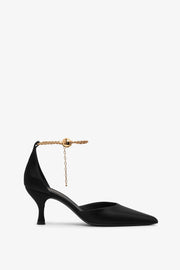 Dana 70 black leather pumps