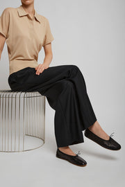 Round black ballet flats