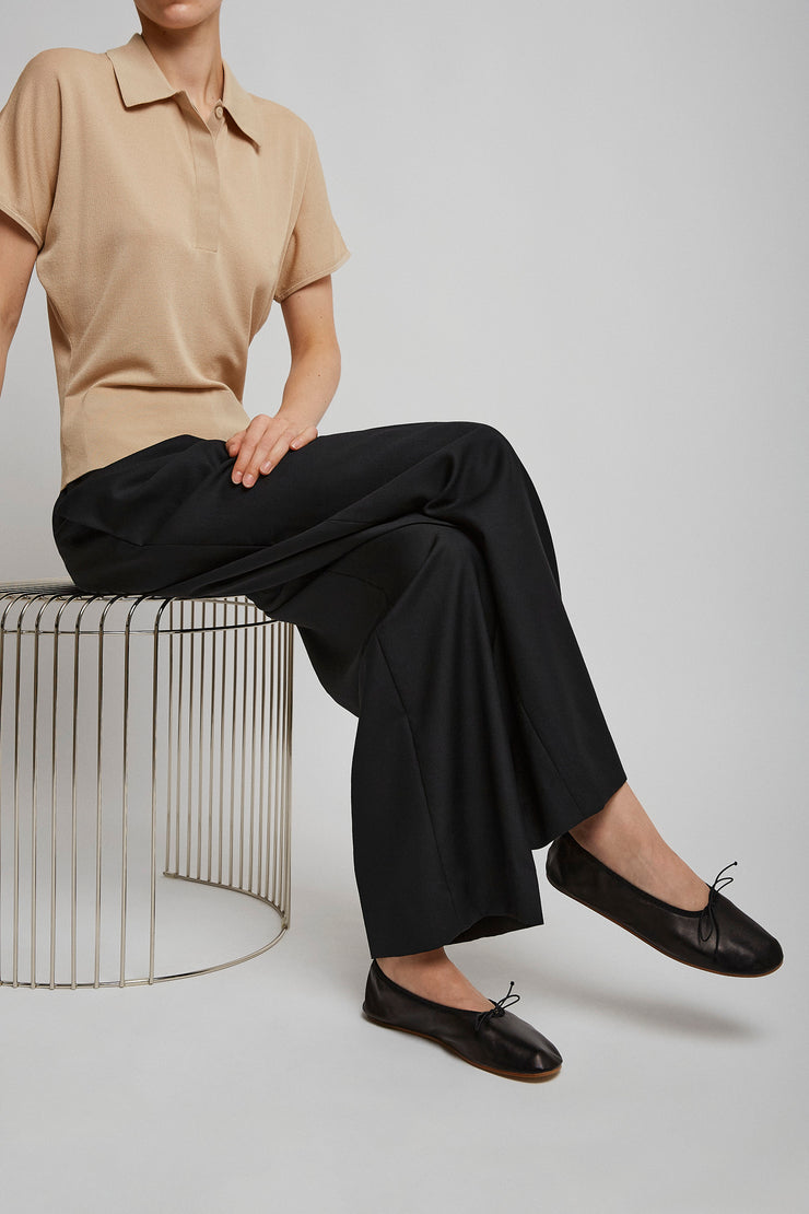 Round black ballet flats