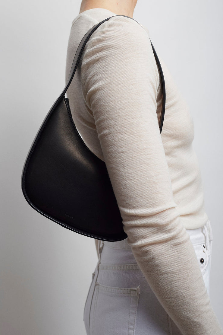 Half moon black leather bag