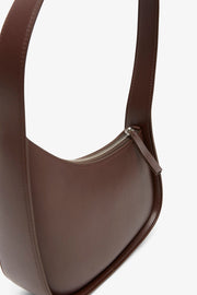 Half moon brown leather bag