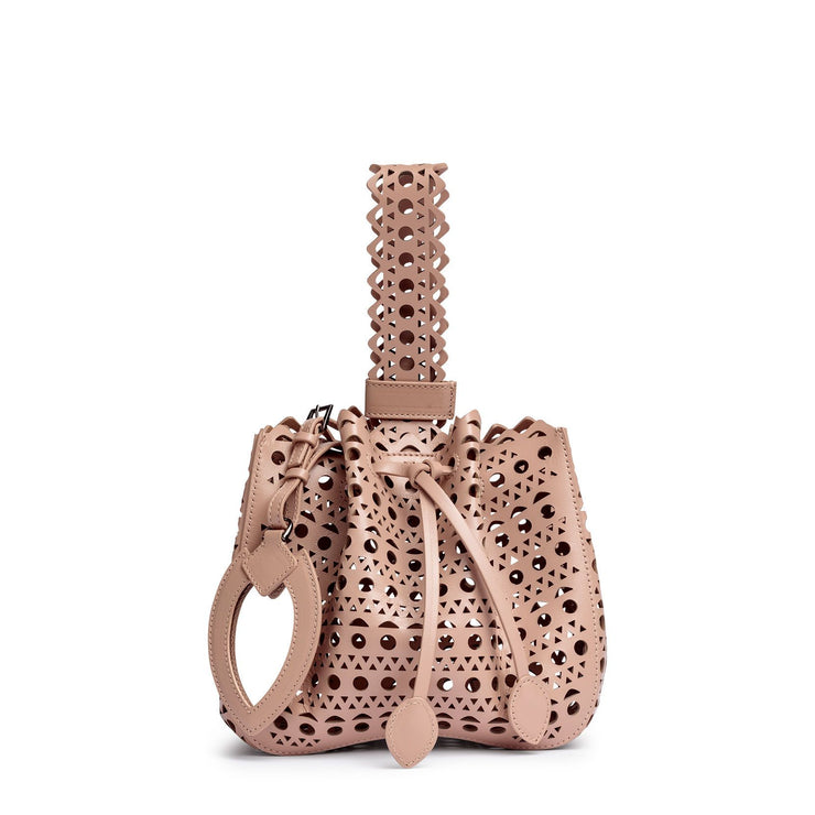 Beige leather laser-cut bucket bag