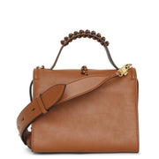 The Story whipstitch brown leather bag