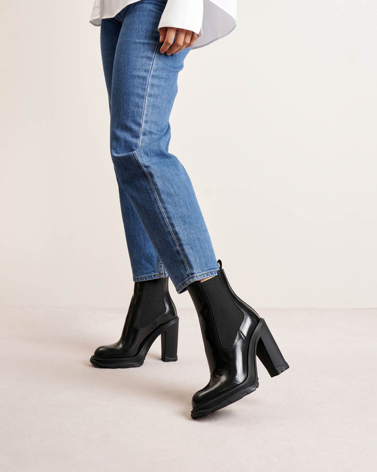Tread heeled black chelsea boots