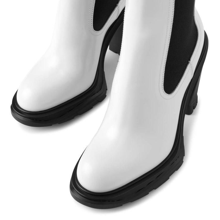 Tread heeled ivory chelsea boots
