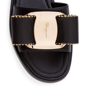 Isera black leather studded bow slide sandals